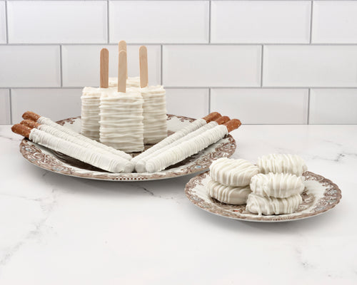 Hand-dipped Rice Krispie treats and chocolate covered pretzels
