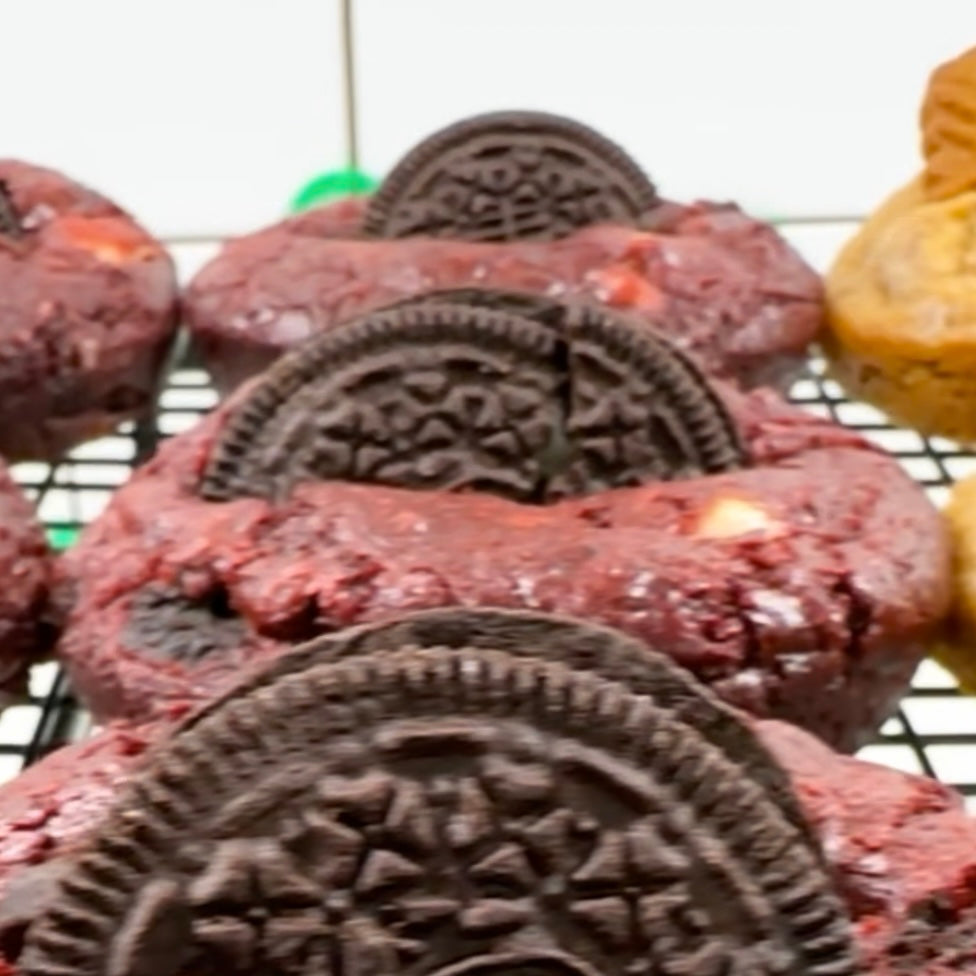 Scarlet Raptor red velvet cookie split open with Oreo pieces